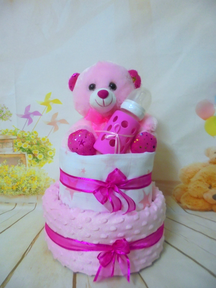 lovely baby pink winter diaper cake